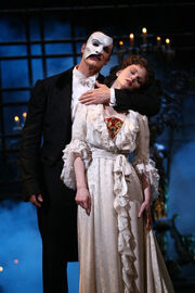 The Phantom soothing Christine to sleep