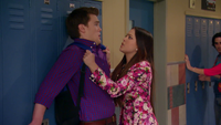 Jasmine slaammed Garrett in a locker!