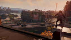 Delsin spostrzega konwój DOZ-owców jadący na miejsce zbrodni (inFamous Second Son)