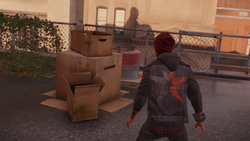 Delsin przygląda się pudłom na dachu (inFamous Second Son)
