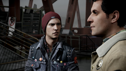 Reggie i Delsin zastanawiają się nad swoim kolejnym ruchem w Queen Anne (inFamous Second Son)