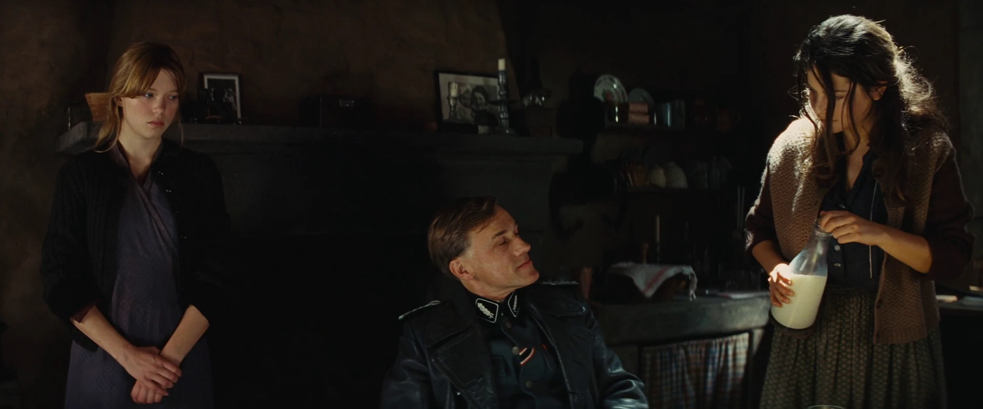 Image Charlotte looks as Suzanne is about to pour Landa milk.jpg