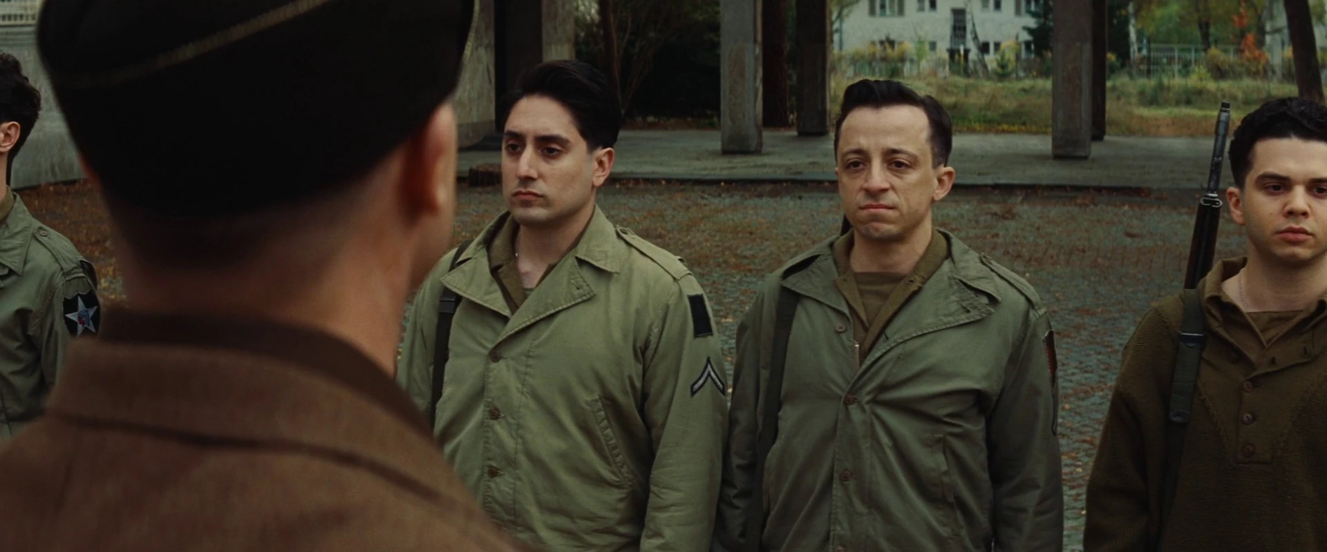 Image Aldo Raine looks at Omar Ulmer and Michael Zimmerman.jpg