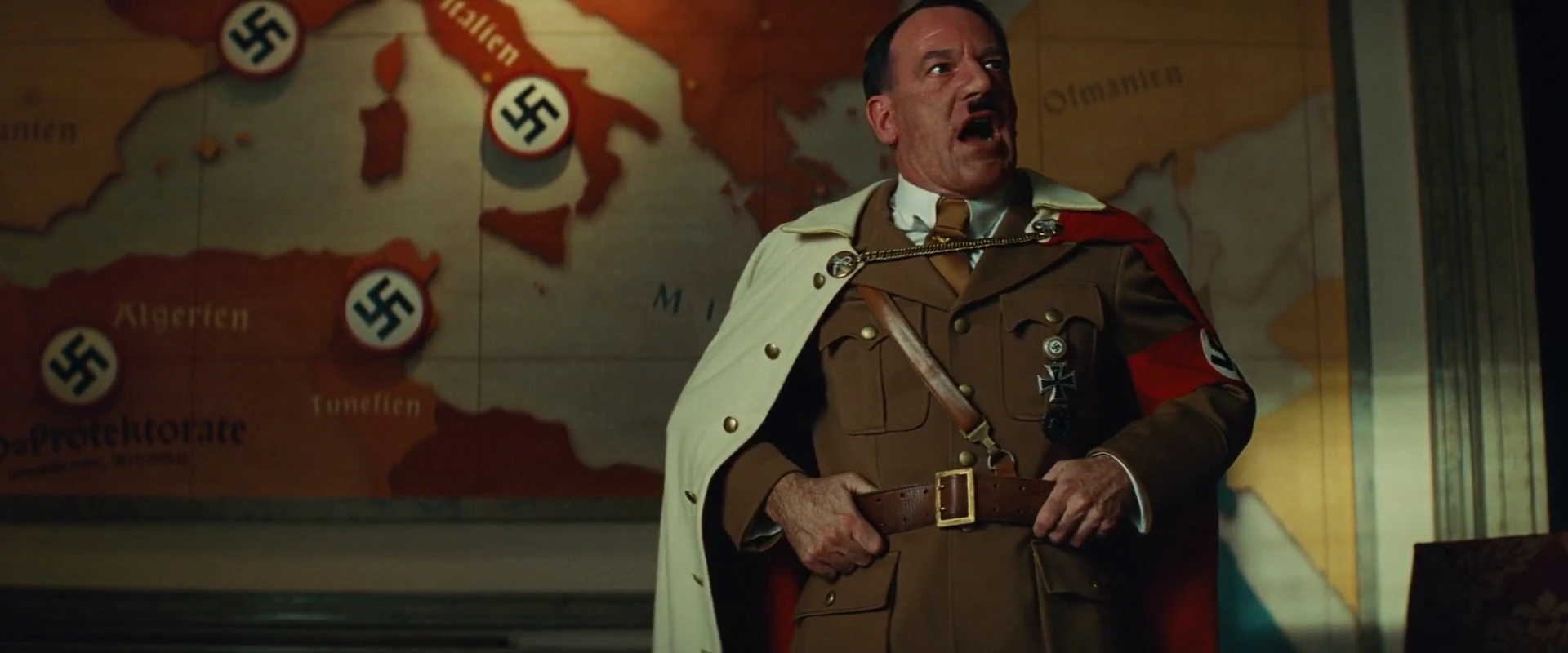 Image Hitler looks at his painting as he threatens.jpg Inglourious