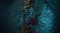 Ava dodges attacks from two enemies