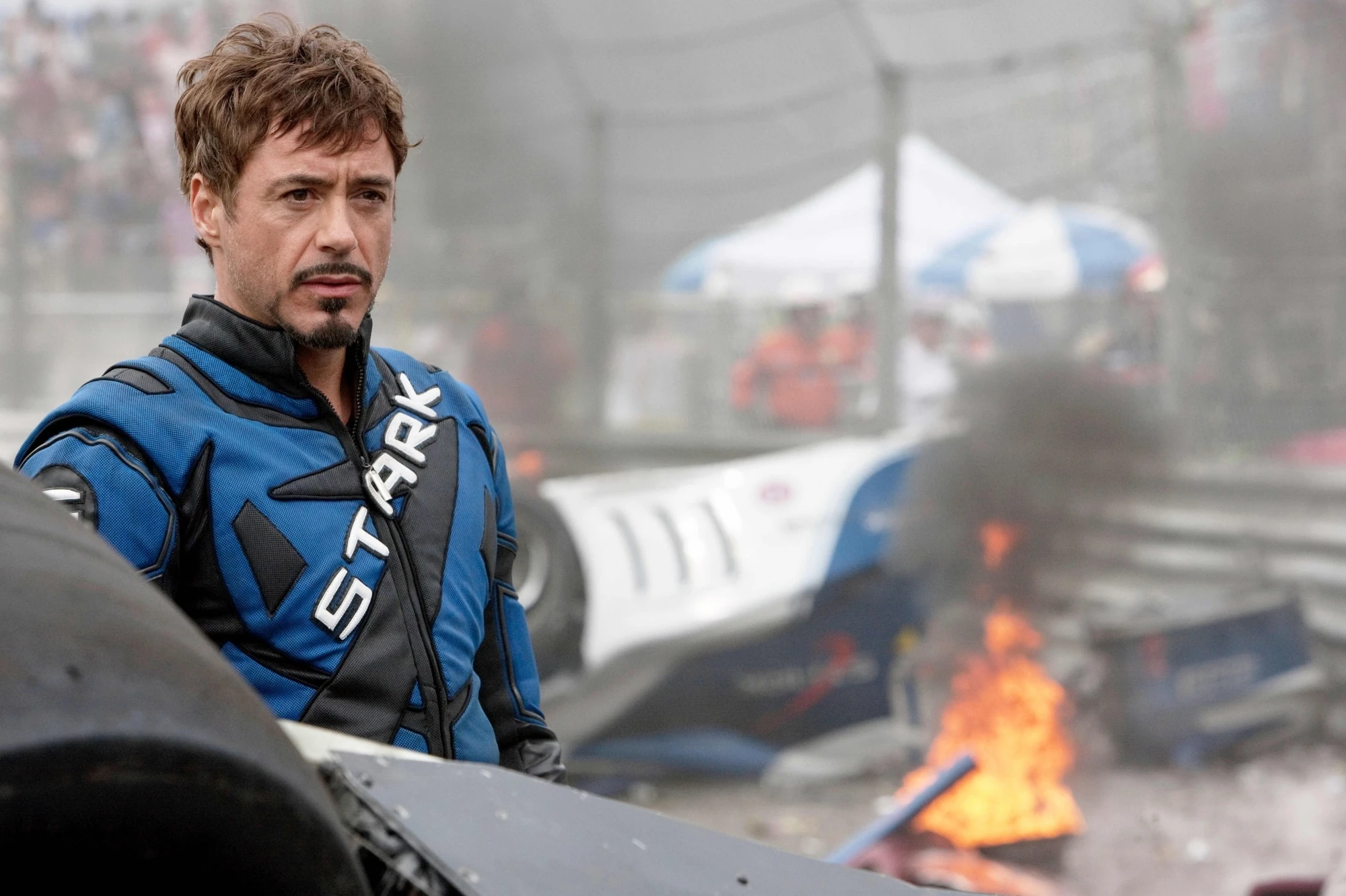 Image Tony in his racing suit.jpg Iron Man Wiki FANDOM powered by