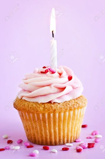 4484539-single-cupcake-with-icing-sprinkles-and-candle