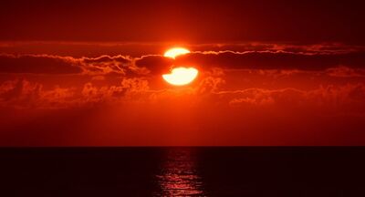THE RED SUN
