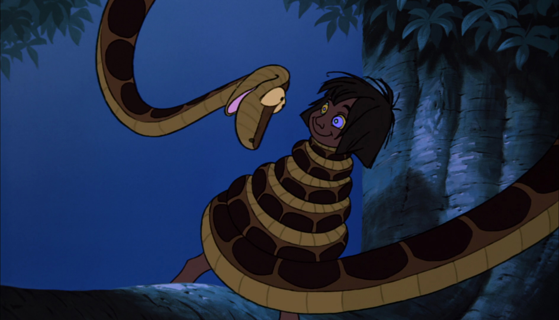 Image - Mowgli is being hypnotized and is wraped up in Kaa ...