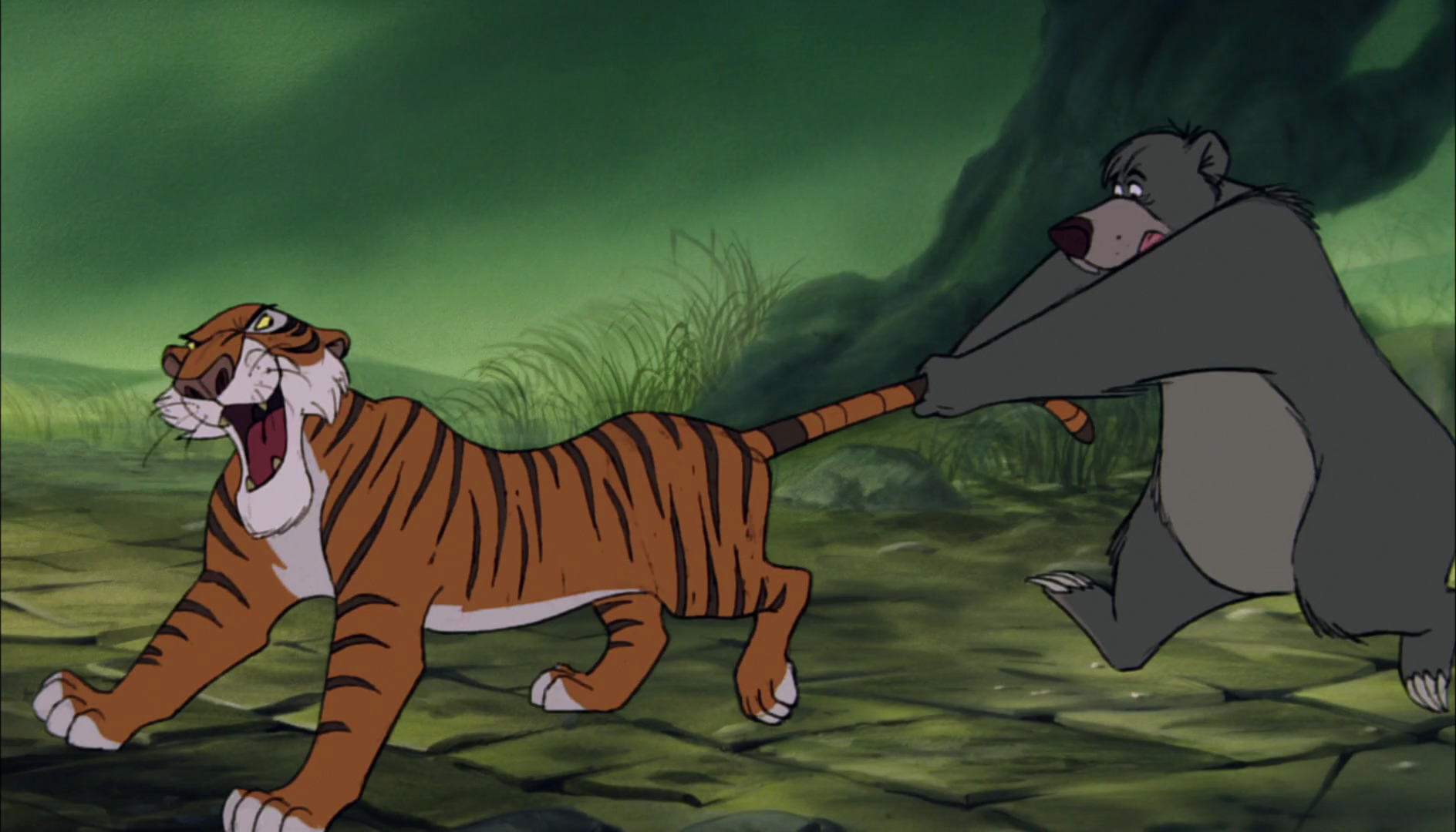 Baloo the bear is holding onto Shere Khan the Tiger s tail