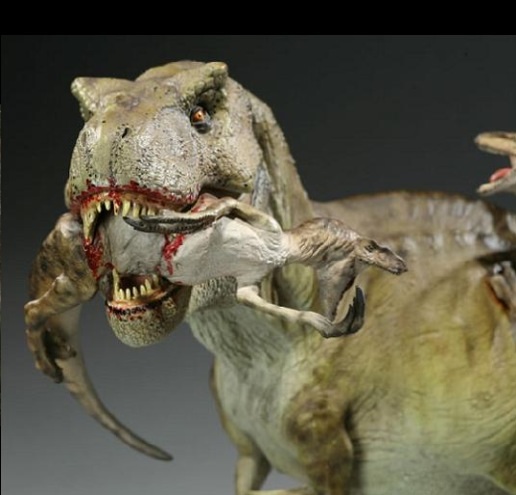 t rex eating a triceratops