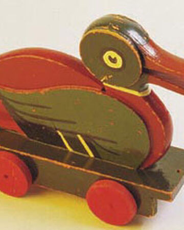 wooden toy duck on wheels