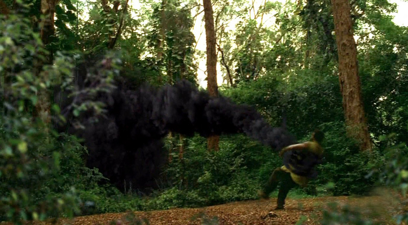 The black smoke monster capturing someone and pulling them into the forest in Lost (2006)