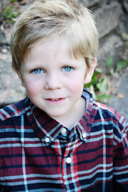 Cute-little-boy-with-blonde-hair-with-gel-in-it