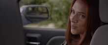 Romanoff speaks to Rogers in their stolen car