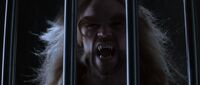 Sabertooth behind bars Earth-10005