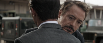 Tony hugs Howard.png