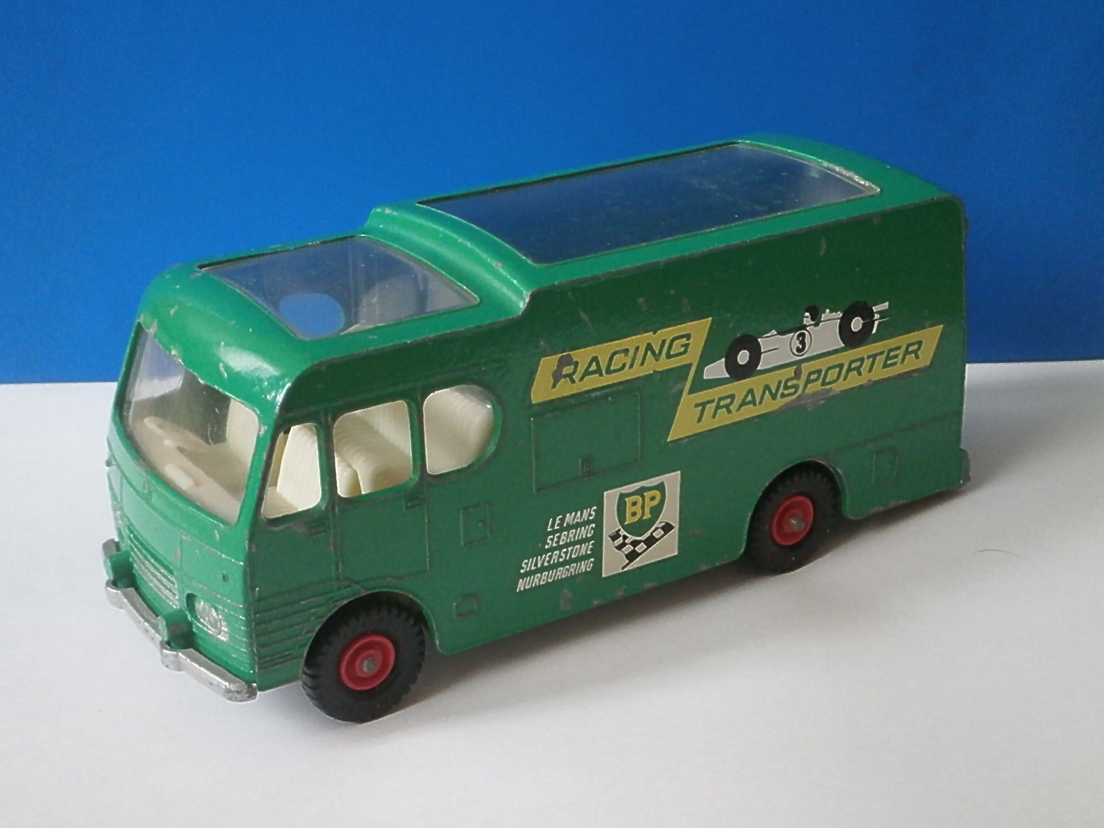 green toys car transporter