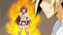 Medaka explaining to Zenkichi why he has to fight