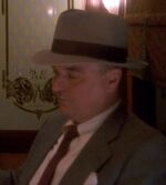 Man in grey flannel suit