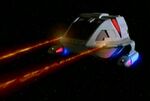 Type 8 shuttle firing phasers