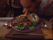 Steak with mushrooms, baked potato with sour cream and chives