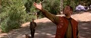 Geordi La Forge mimics Zefram Cochrane's statue