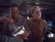 Sisko demonstrates how to use a whisk