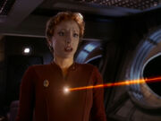 Kira hit by phaser
