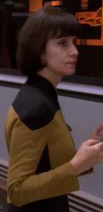 Female engineer, early 2369