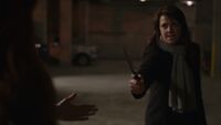 Helen defending Typhuss from Selina