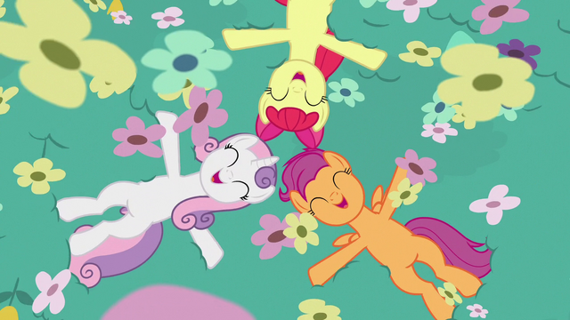 File:Adult Crusaders lying in field of flowers S9E22.png