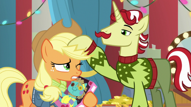 File:Flam ruffling Applejack's mane MLPBGE.png