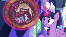 Twilight presenting an ancient shield S8E23