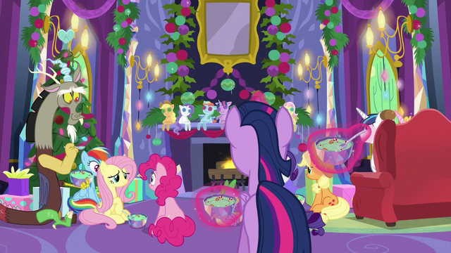 File:Ponies eating pudding around the fireplace MLPBGE.png