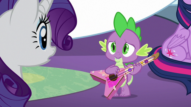 File:Spike holding a homemade guitar MLPBGE.png