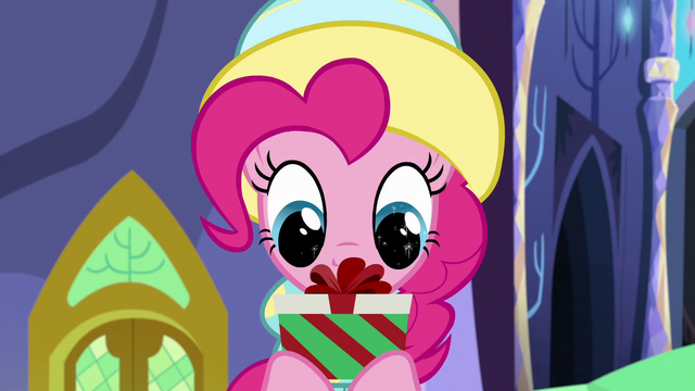 File:Pinkie Pie looking at Twilight's gift MLPBGE.png