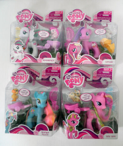 File:Blossomforth, Cupcake, Dewdrop Dazzle and Lulu Luck toys.jpg