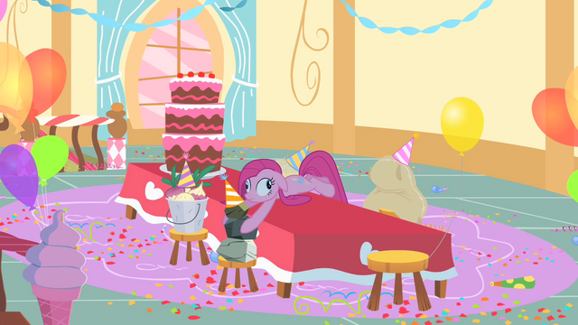 File:Pinkie Pie laying on the table with derpy eyes S1E25.png