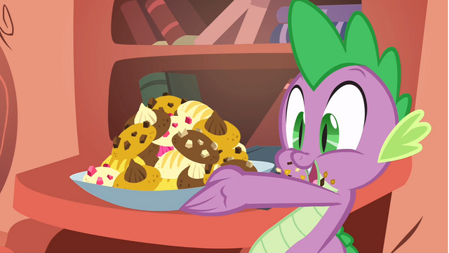 File:Spike looking at his freshly baked cookies S1E24.png