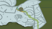 Snail crawling across Twilight's statue S1E17