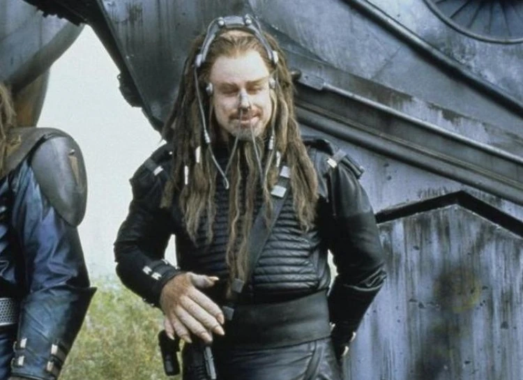 https://vignette.wikia.nocookie.net/mst3k/images/8/88/RiffTrax-_John_Travolta_in_Battlefield_Earth.jpg/revision/latest?cb=20140609055919