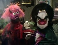 Pink Creature and Magician