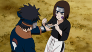 Rin treating Obito's wound.