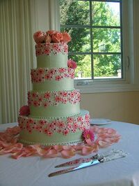 Pink decorated wedding cake