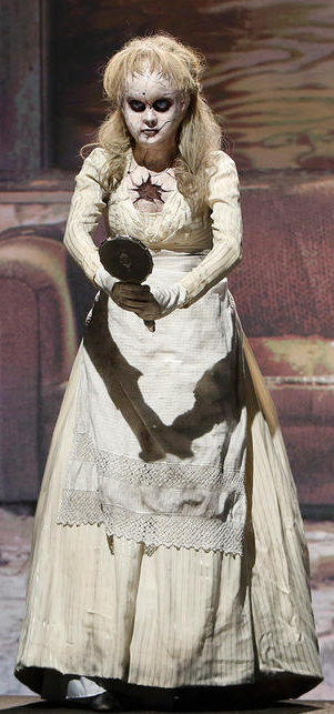 face off porcelain doll