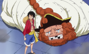Luffy protégant Barbe Brune