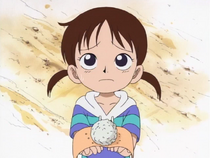 Rika holding onigiri