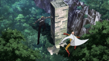 Saitama and Genos arrive at the House of Evolution
