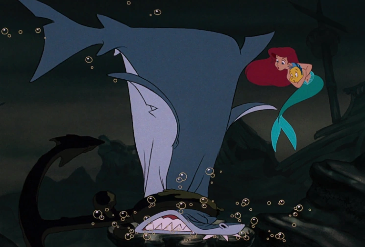 Image Ariel and Flounder outsmarting Glut the Shark.png Heroes Wiki
